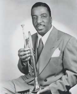 Erskine Hawkins holding trumpet