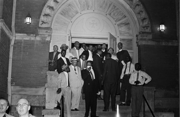 Group of men standing at the entrance of First Baptist Church in Montgomery, Alabama