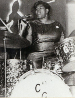 Big Mama Thornton singing and playing the drums