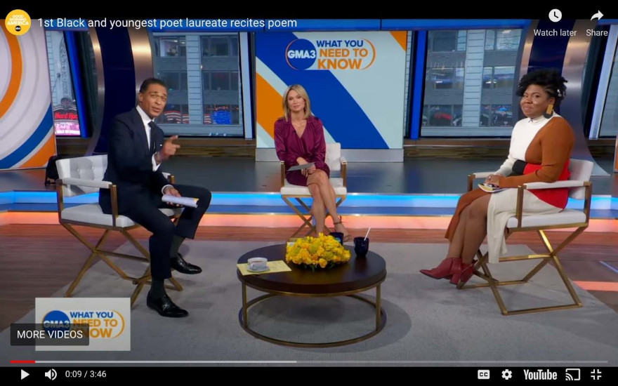 Screenshot of Alabama Poet Laureate Ashley M. Jones' interview appearance on television with hosts of Good Morning America. The headline at the top of the screen says First Black and Youngest Poet Laureate Recites Poem.