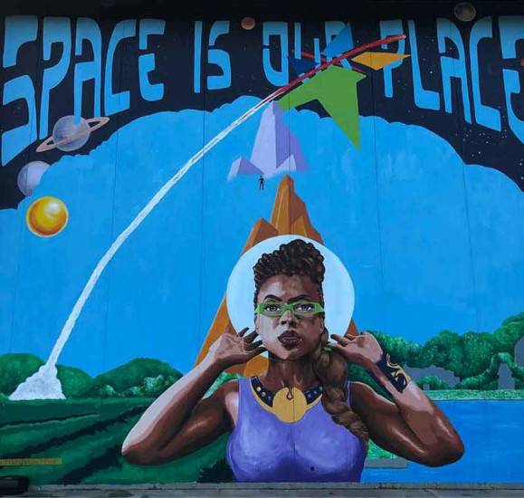 Space is Our Place mural in Huntsville, Alabama, by Jahni the Artist