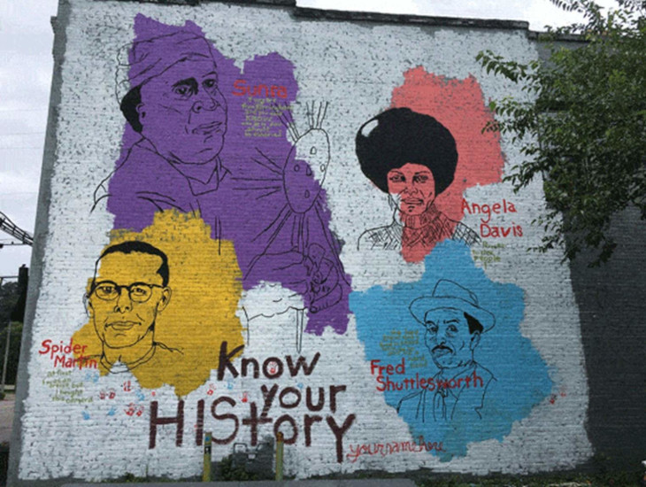 Know Your History mural on 41st Street in Avondale of Birmingham, Alabama, by artist Tim Kerr. Features civil rights activist Fred Shuttlesworth, iconic jazz musician Sun Ra, activist Angela Davis, and photo journalist Spider Martin.