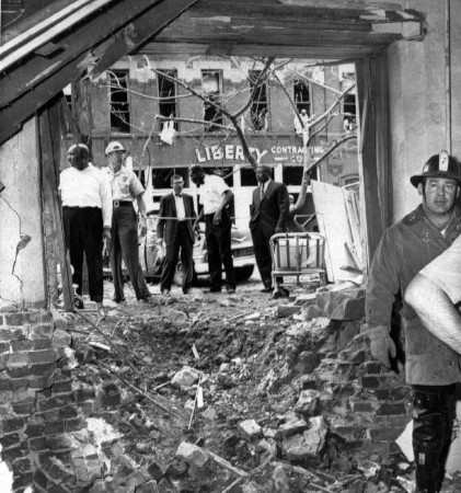 Crater and other damage caused by the bombing of the Sixteenth Street Baptist Church, September 15, 1963.