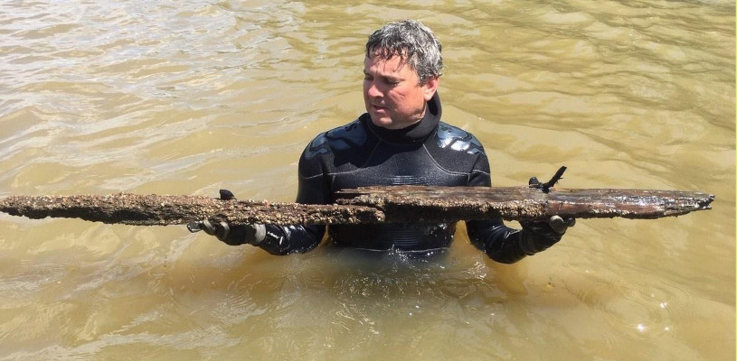 Historian Ben Raines with wreckage from the slave ship Clotilda.