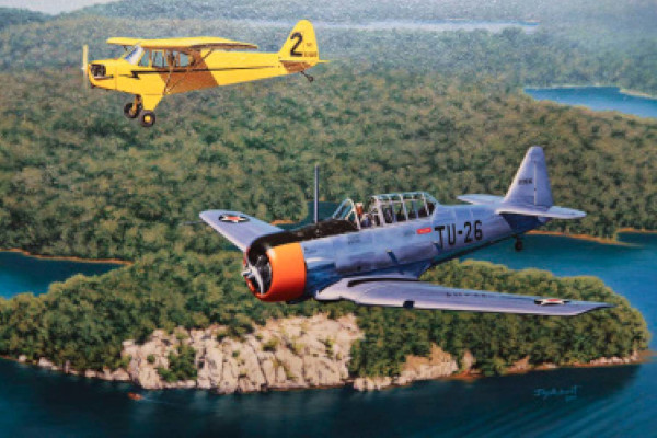 Two airplanes flying over Herbert Carter and Mildred Hemmons Carter’s rendezvous point at Lake Martin.