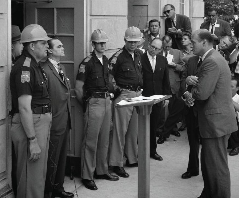 George Wallace confronting Alabama National Guard troops at the door of Foster Auditorium on the University of Alabama campus, symbolically blocking the enrollment of two Black students