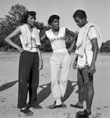 Nell Jackson with teammates Evelyn Lawler and Ella McNabb.