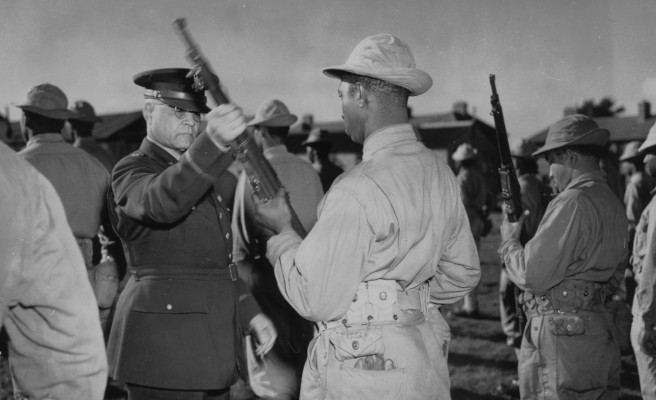 Brigadier General Benjamin O. Davis, Sr. inspects Black troops in England, October 1942.