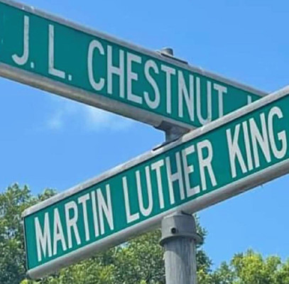 street sign at the intersection of J.L. Chestnut Jr. Blvd. and Martin Luther King Jr. Street