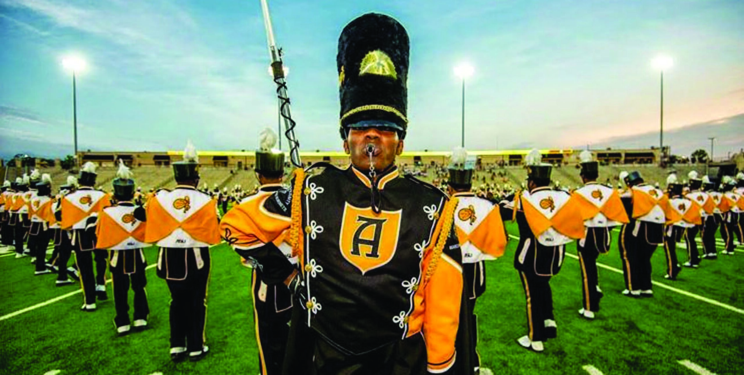 Alabama State University Marching Hornets band performing on football field