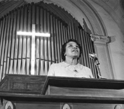 Amelia Boynton speaking to an audience during a civil rights meeting at Brown Chapel AME Church in Selma, Alabama.