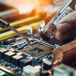 engineer fixing computer