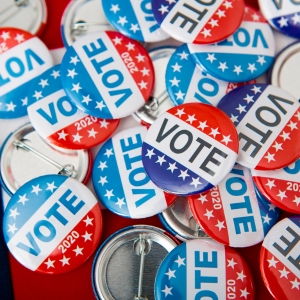 Red, white, and blue voting pins for an American election